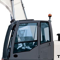 Стекло  форточки Terex TX 210L (ближе к заднему)
